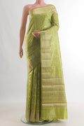 Pure Silk Green Banarasi Raw Saree with Zari Brocade on the body and Zari Border.  displayed on a mannequin