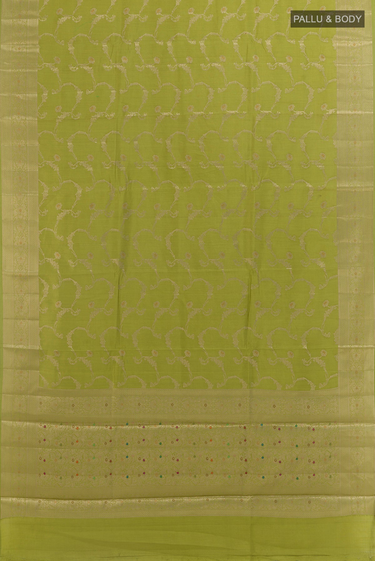 Flat view of Pure Silk Green Banarasi Raw Saree with Zari Brocade on the body and Zari Border. 