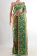 Golden Dual Tone Kanjivaram Tissue Saree with Zari Brocade on the body and Zari Border.  displayed on a mannequin