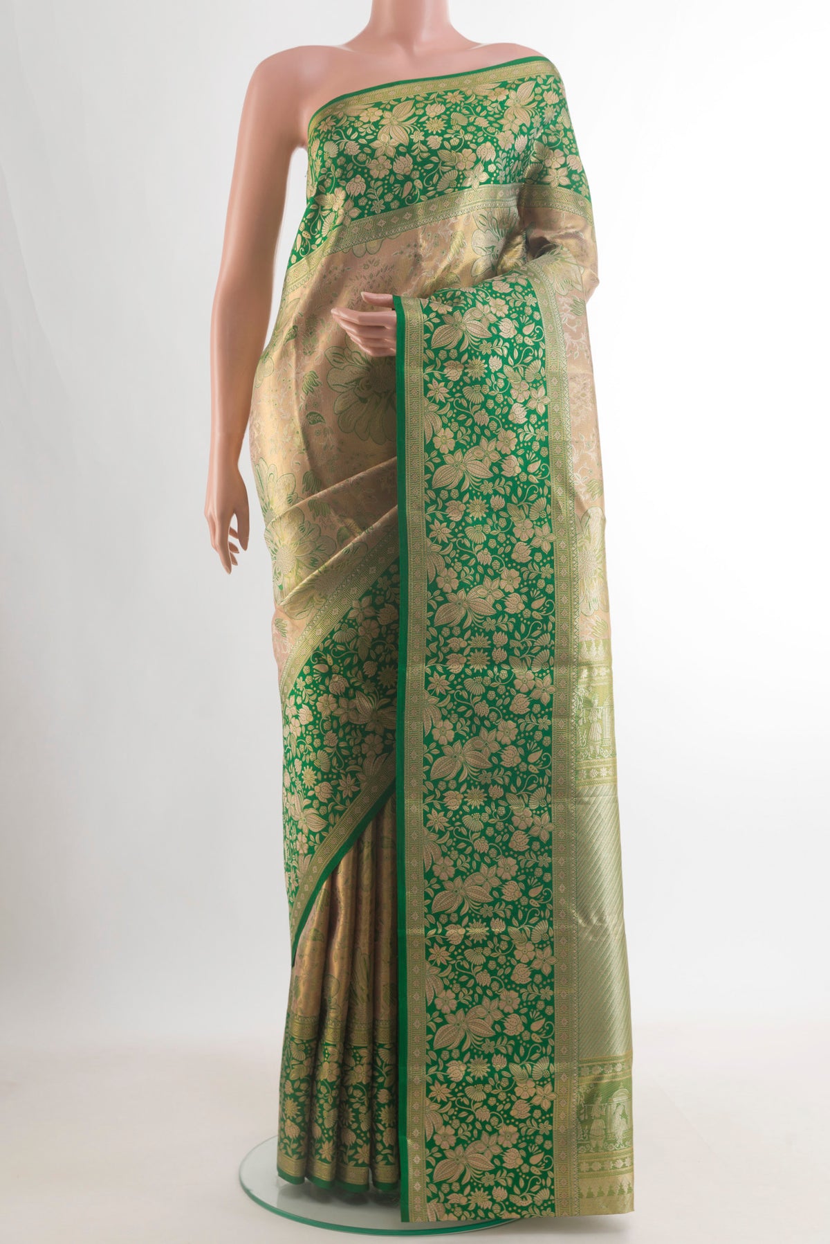 Golden Dual Tone Kanjivaram Tissue Saree with Zari Brocade on the body and Zari Border.  displayed on a mannequin