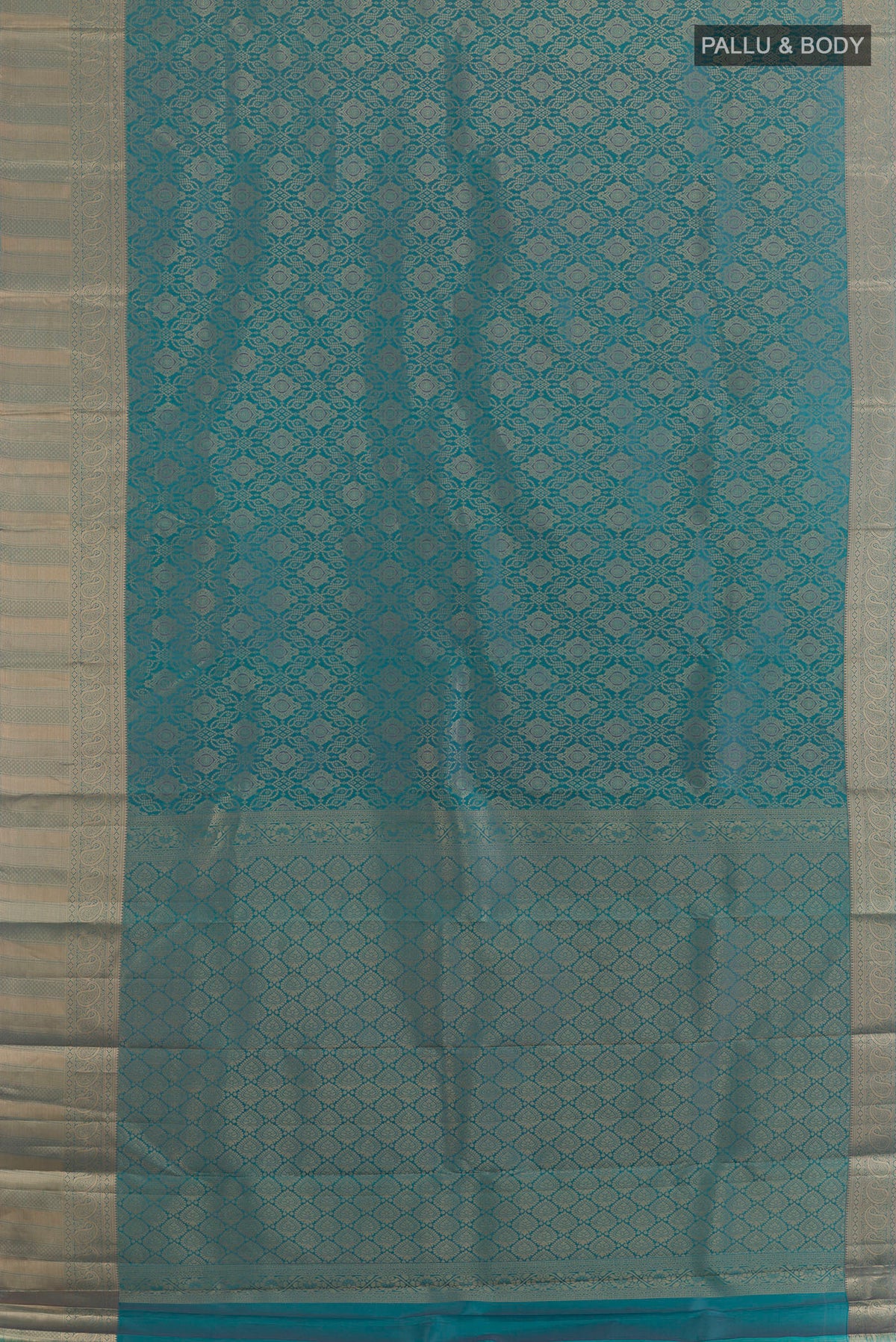 Flat view of Pure Silk Blue Kanjivaram Saree with Zari Brocade on the body and Zari Border. 