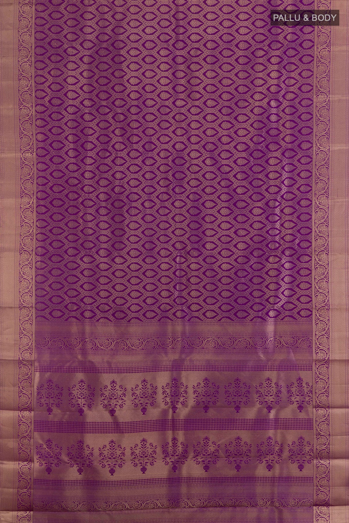 Flat view of Pure Silk Purple Kanjivaram Saree with Zari Brocade on the body and Zari Border. 