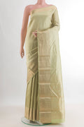 Pure Silk Light Green Kanjivaram Saree with Zari Brocade on the body and Zari Border.  displayed on a mannequin