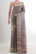Pure Silk Grey Kanjivaram Saree with Zari Brocade on the body and Zari Border.  displayed on a mannequin