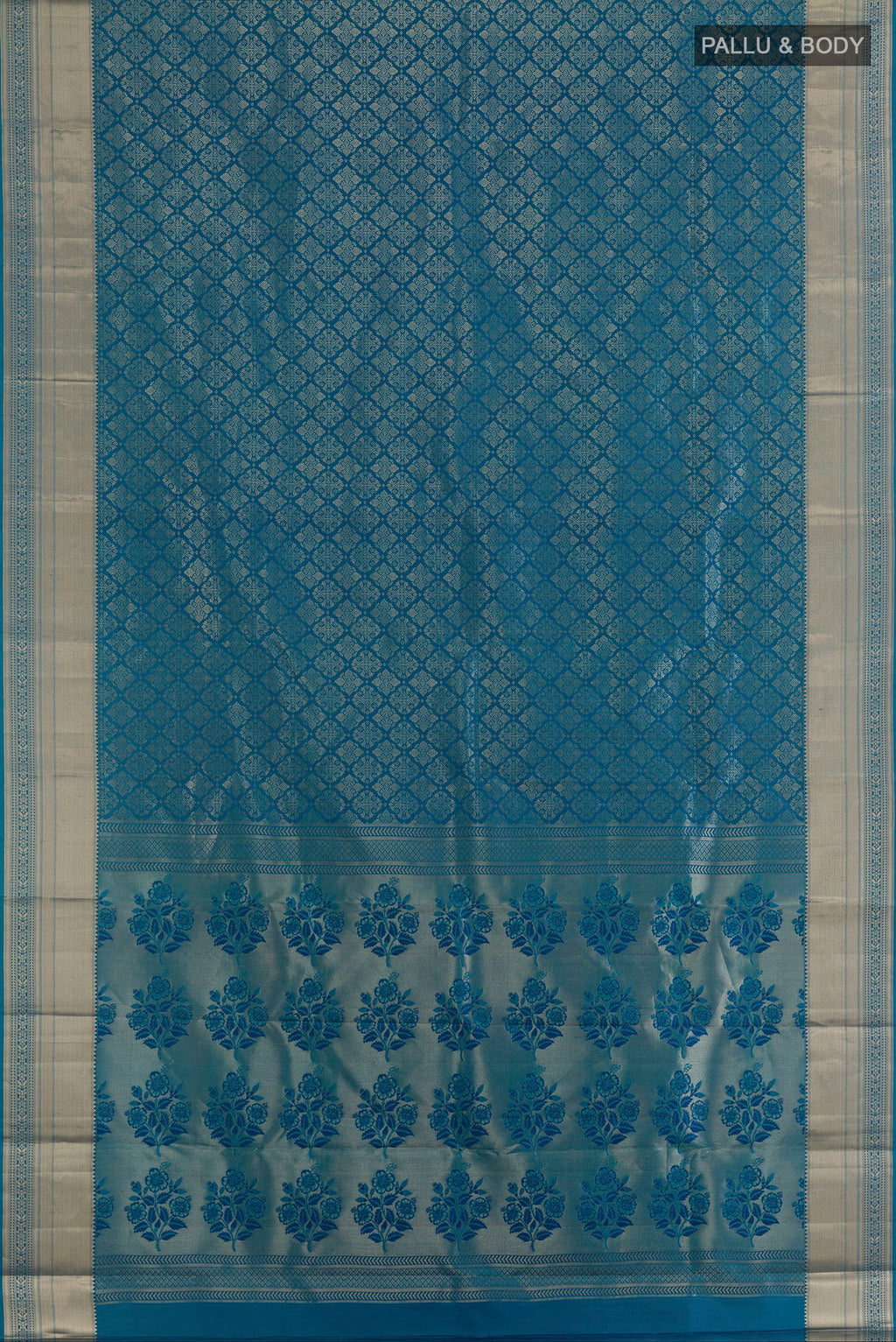Flat view of Pure Silk Peacock Blue Kanjivaram Saree with Zari Brocade on the body and Zari Border. 