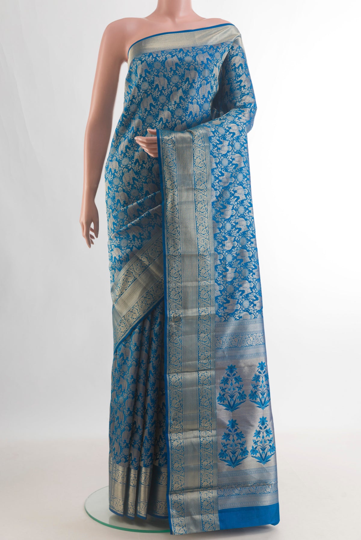 Pure Silk Blue Dual Tone Kanjivaram Saree with Zari Brocade on the body and Zari Border.  displayed on a mannequin