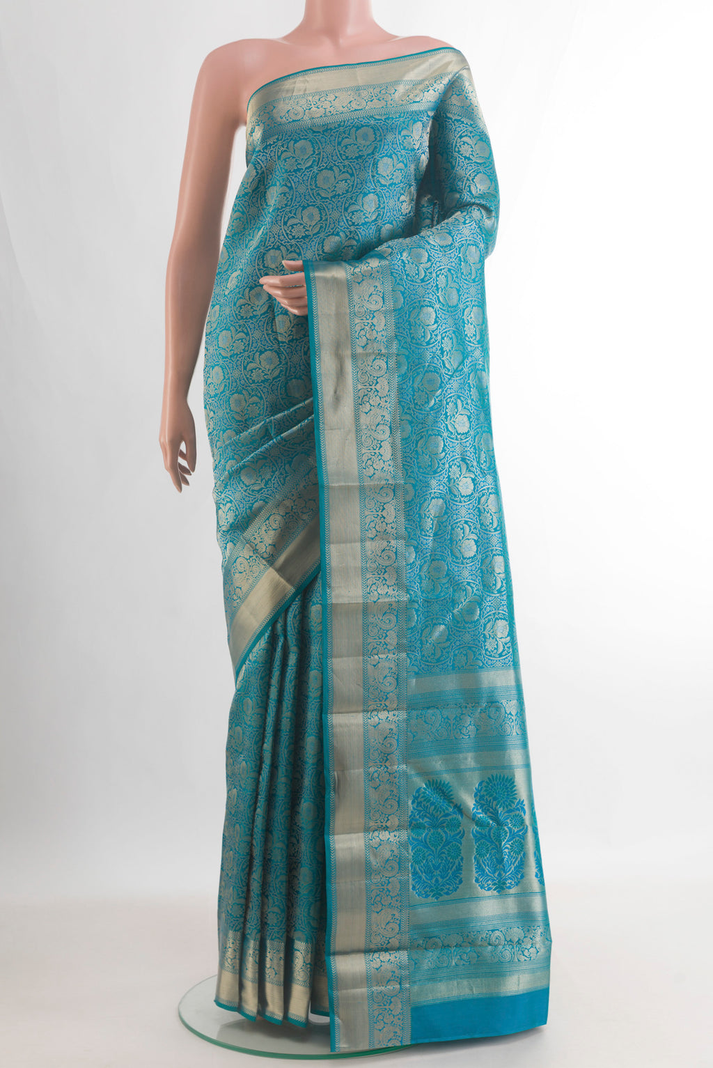 Pure Silk Blue Kanjivaram Saree with Zari Brocade on the body and Zari Border.  displayed on a mannequin