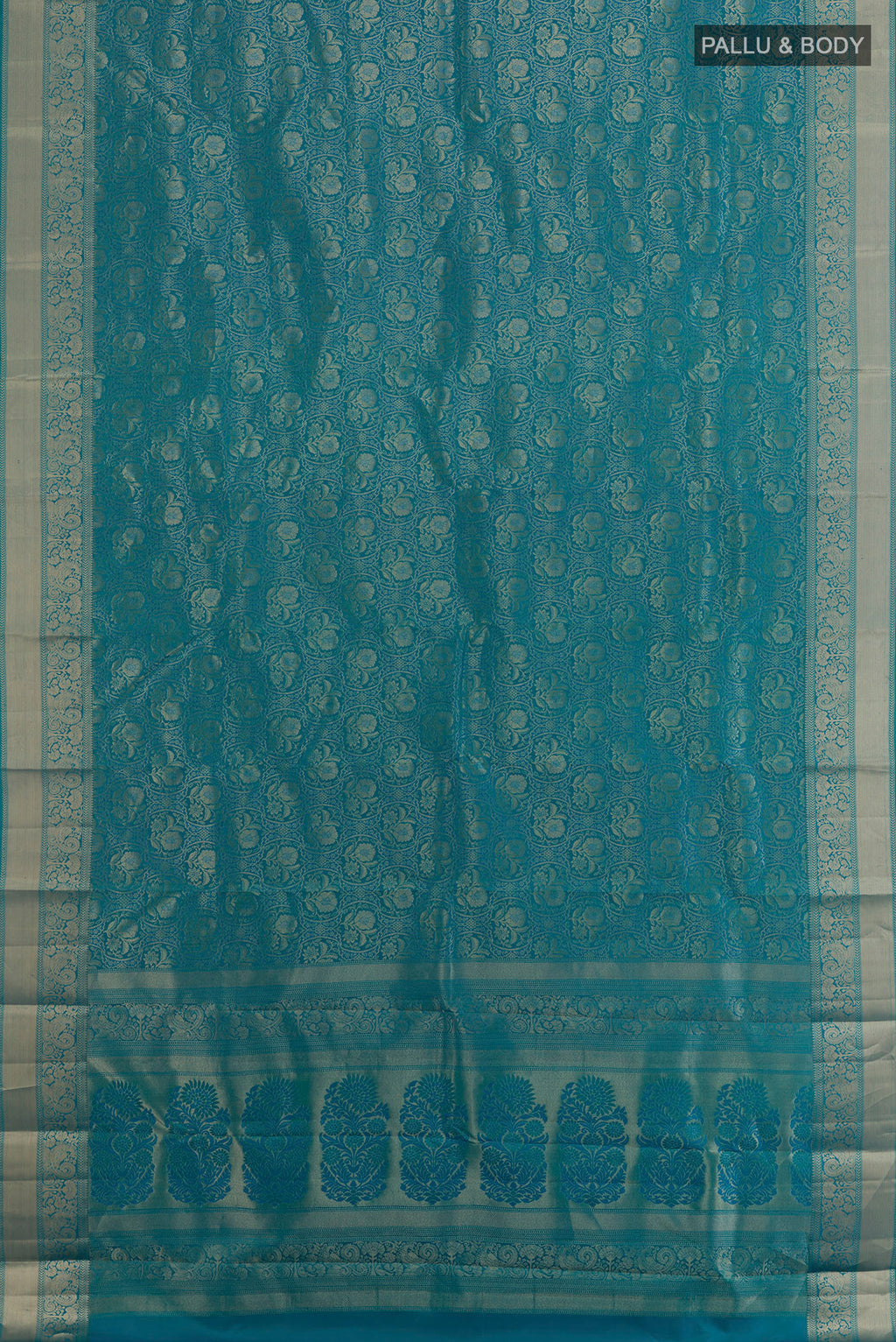 Flat view of Pure Silk Blue Kanjivaram Saree with Zari Brocade on the body and Zari Border. 