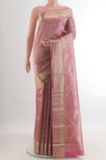 Pure Silk Pink Kanjivaram Saree with Zari Brocade on the body and Zari Border.  displayed on a mannequin