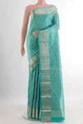 Pure Silk Turquoise Kanjivaram Saree with Zari Brocade on the body and Zari Border.  displayed on a mannequin