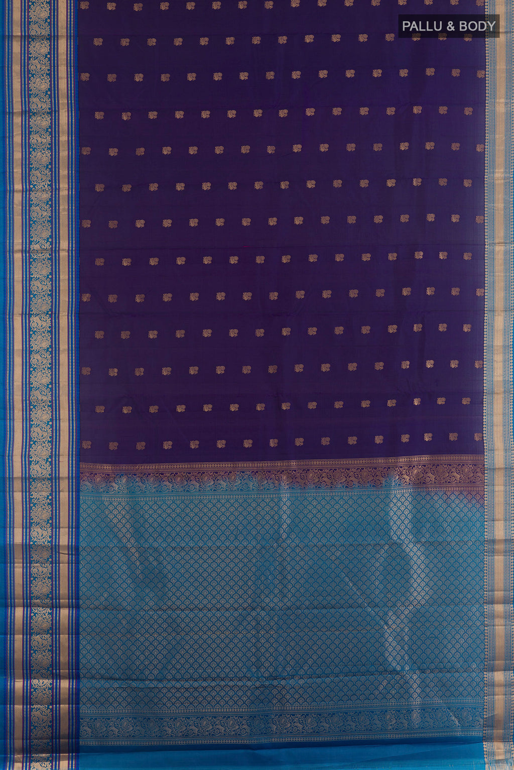 Flat view of Pure Silk Navy Blue Kanchipuram Saree with Zari Butta on the body and Zari Border. 