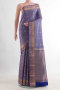 Pure Silk Lilac Kanchipuram Saree with Jacquard With Zari Butta on the body and Zari Border.  displayed on a mannequin
