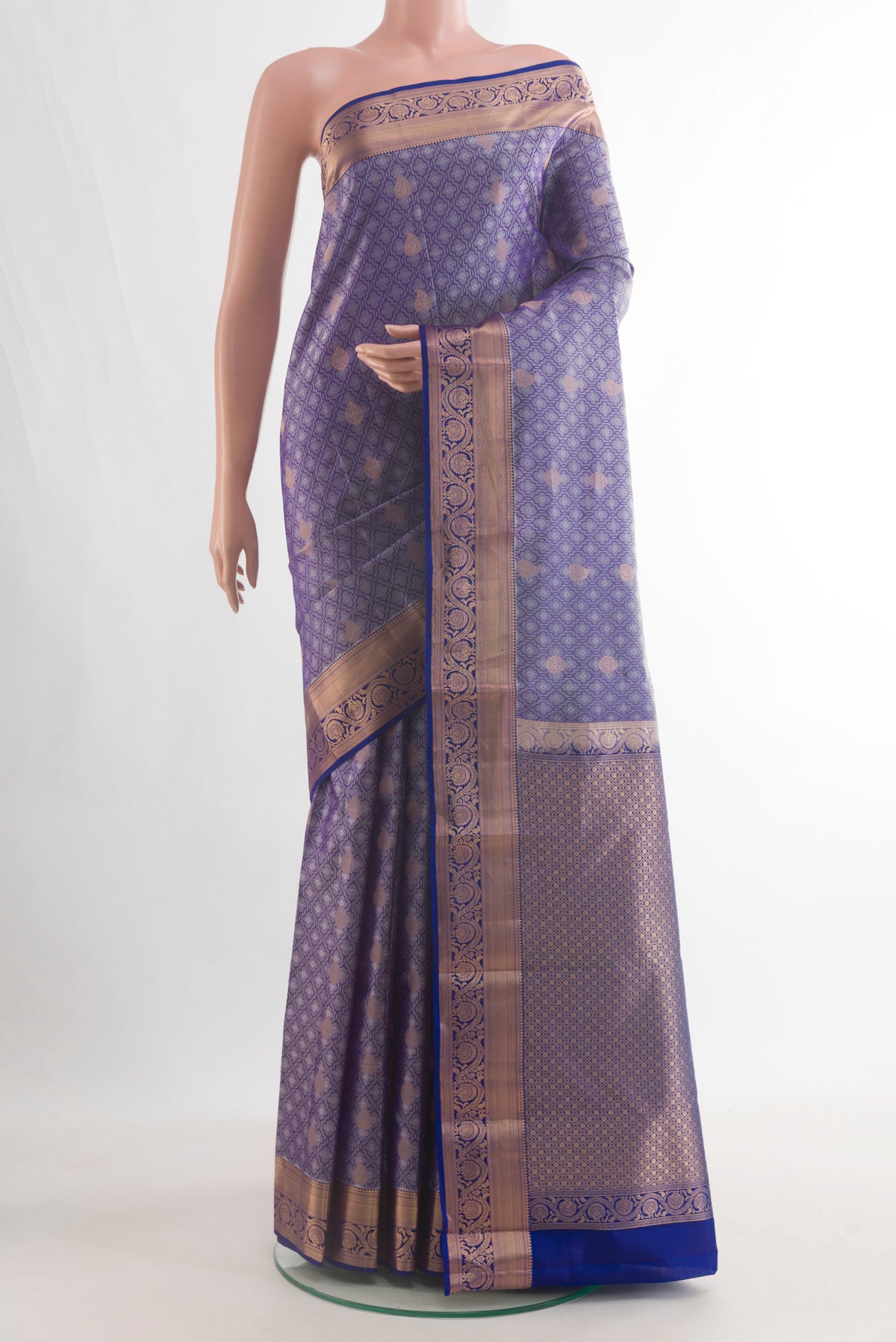 Pure Silk Lilac Kanchipuram Saree with Jacquard With Zari Butta on the body and Zari Border.  displayed on a mannequin