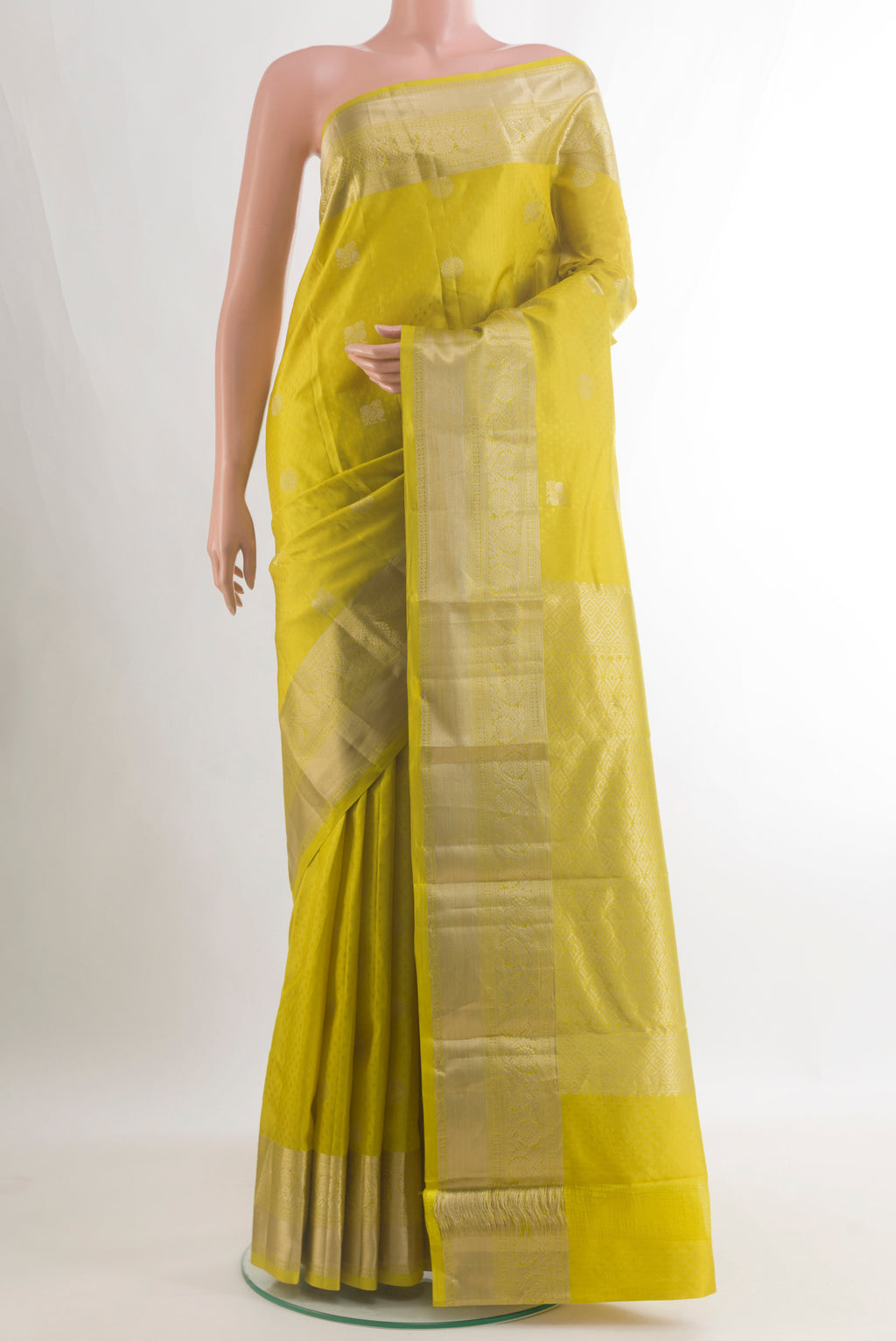 Pure Silk Yellow Kanchipuram Saree with Jacquard With Zari Butta on the body and Zari Border.  displayed on a mannequin