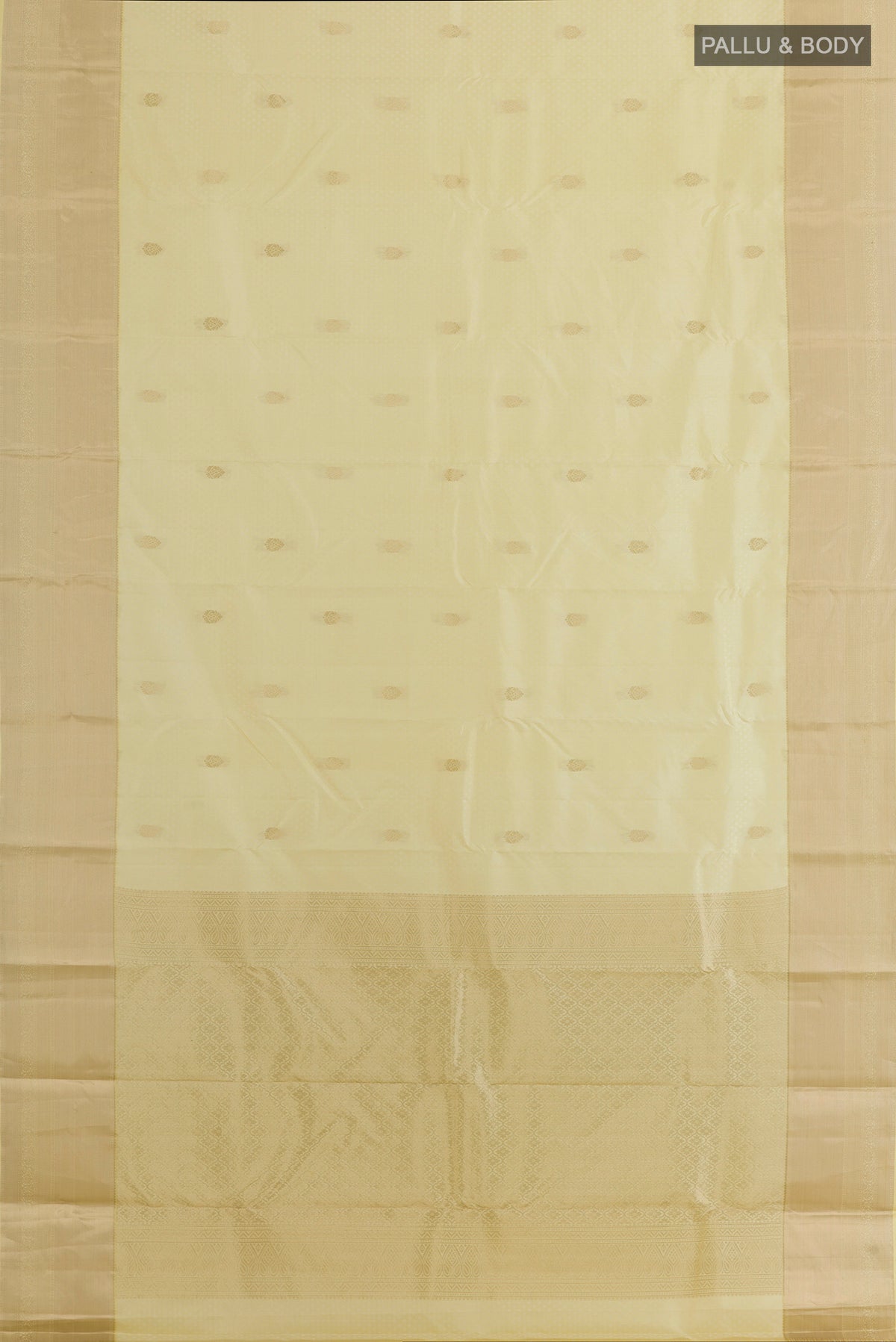 Flat view of Pure Silk Cream Kanchipuram Saree with Jacquard With Zari Butta on the body and Zari Border. 
