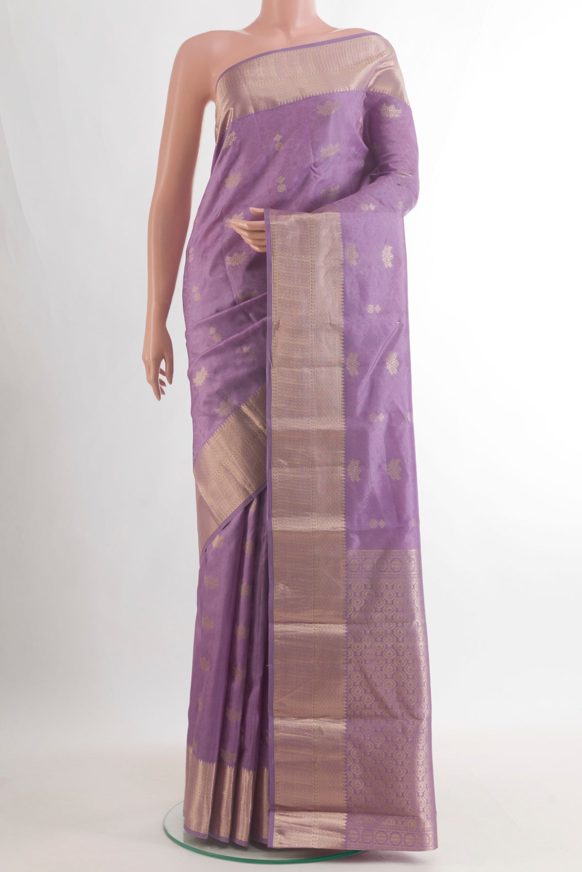 Pure Silk Lavender Kanchipuram Saree with Jacquard With Zari Butta on the body and Zari Border.  displayed on a mannequin