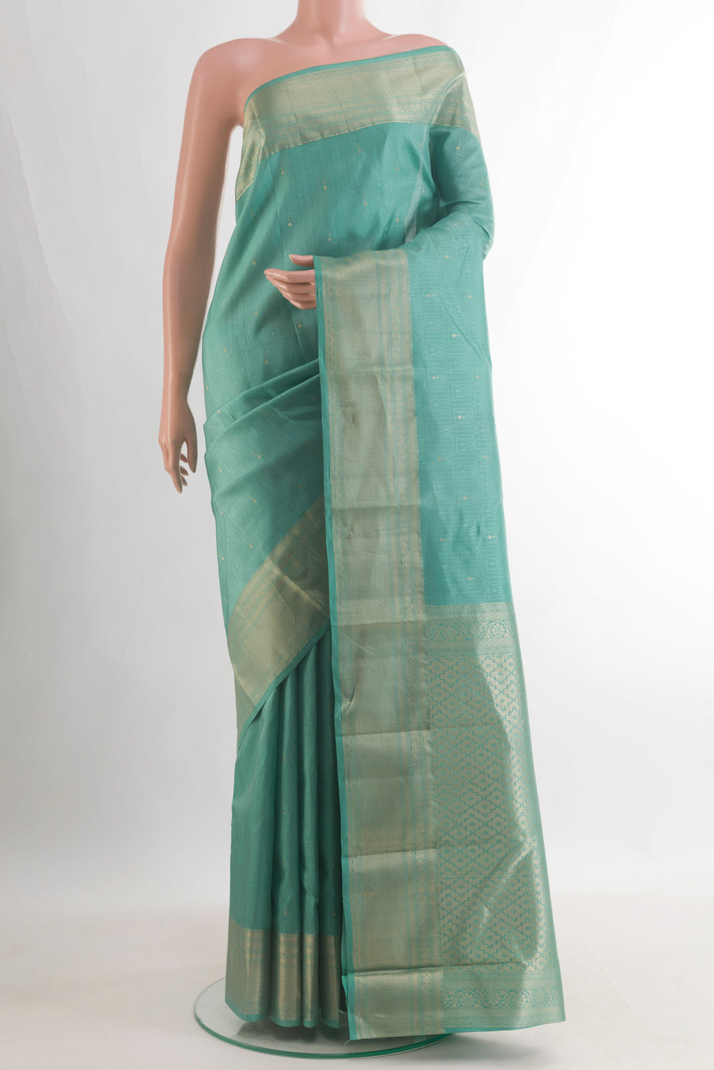 Pure Silk Sea Green Kanchipuram Saree with Jacquard With Zari Butta on the body and Zari Border.  displayed on a mannequin
