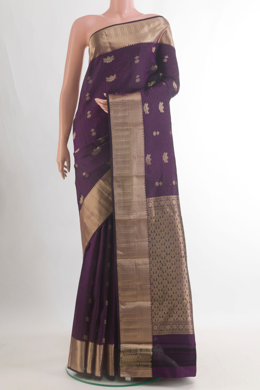 Pure Silk Purple Kanchipuram Saree with Jacquard With Zari Butta on the body and Zari Border.  displayed on a mannequin