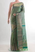 Pure Silk Green Kanchipuram Saree with Zari Brocade on the body and Zari Border.  displayed on a mannequin