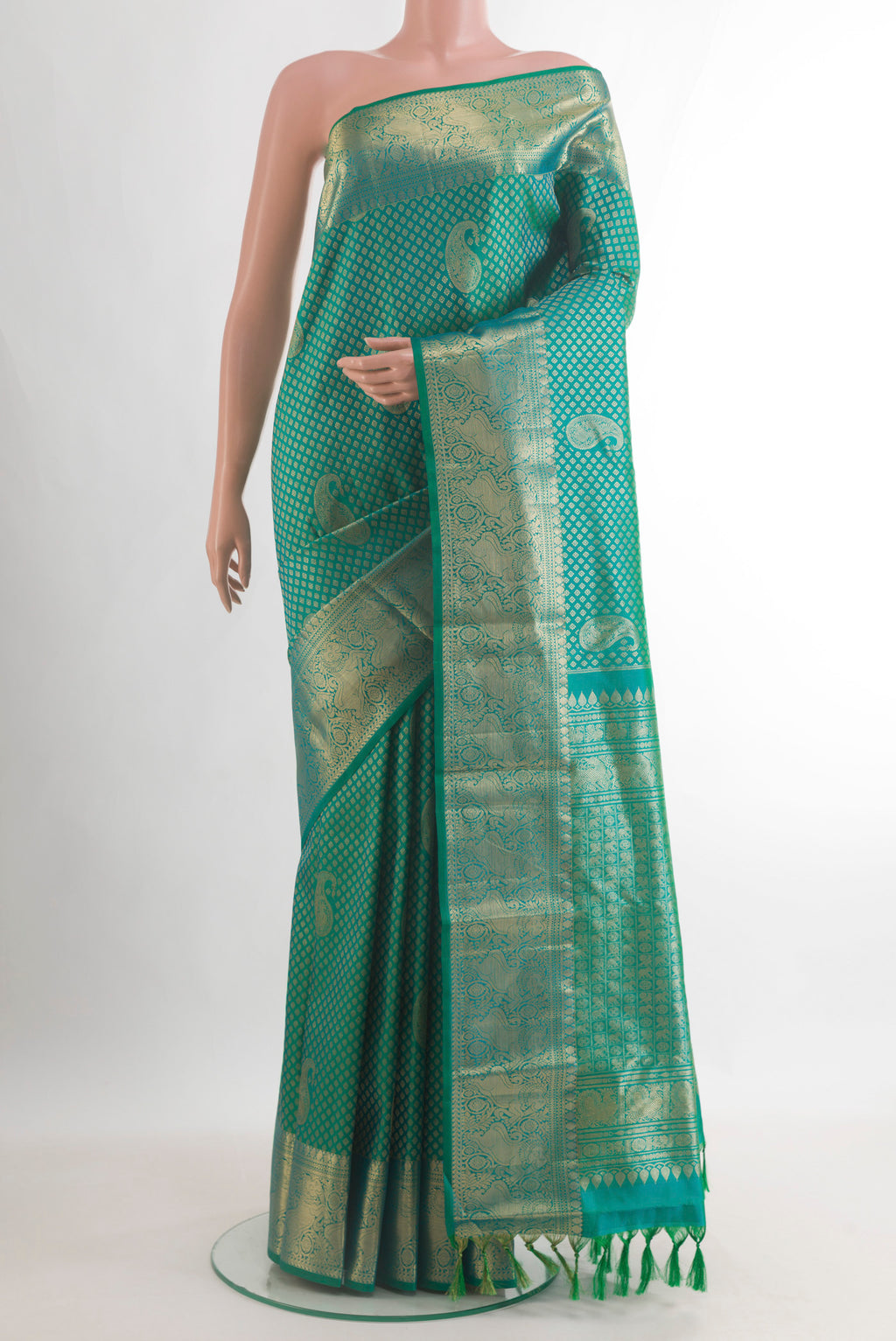 Pure Silk Sea Green Kanchipuram Saree with Zari Brocade on the body and Zari Border.  displayed on a mannequin