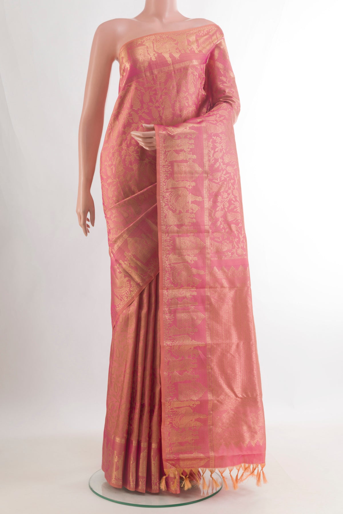 Pure Silk Coral Dual Tone Kanchipuram Saree with Zari Brocade on the body and Zari Border.  displayed on a mannequin