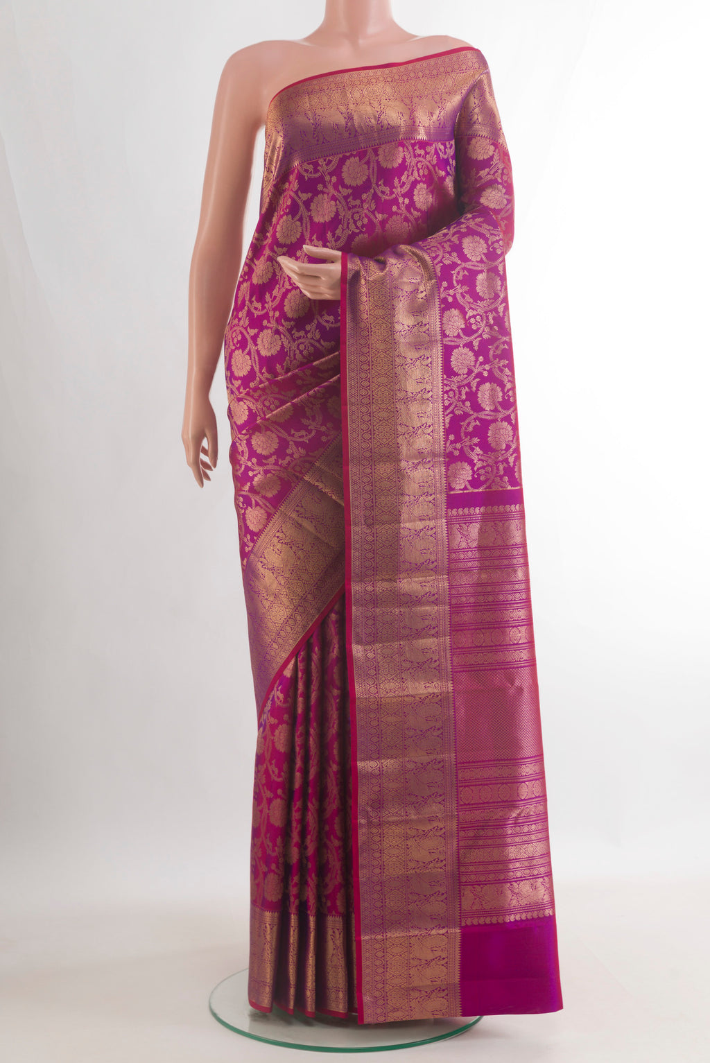 Pure Silk Purple Kanchipuram Saree with Zari Brocade on the body and Zari Border.  displayed on a mannequin