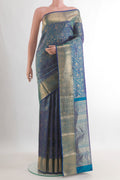 Pure Silk Peacock Blue Dual Tone Kanchipuram Saree with Zari Brocade on the body and Zari Border.  displayed on a mannequin