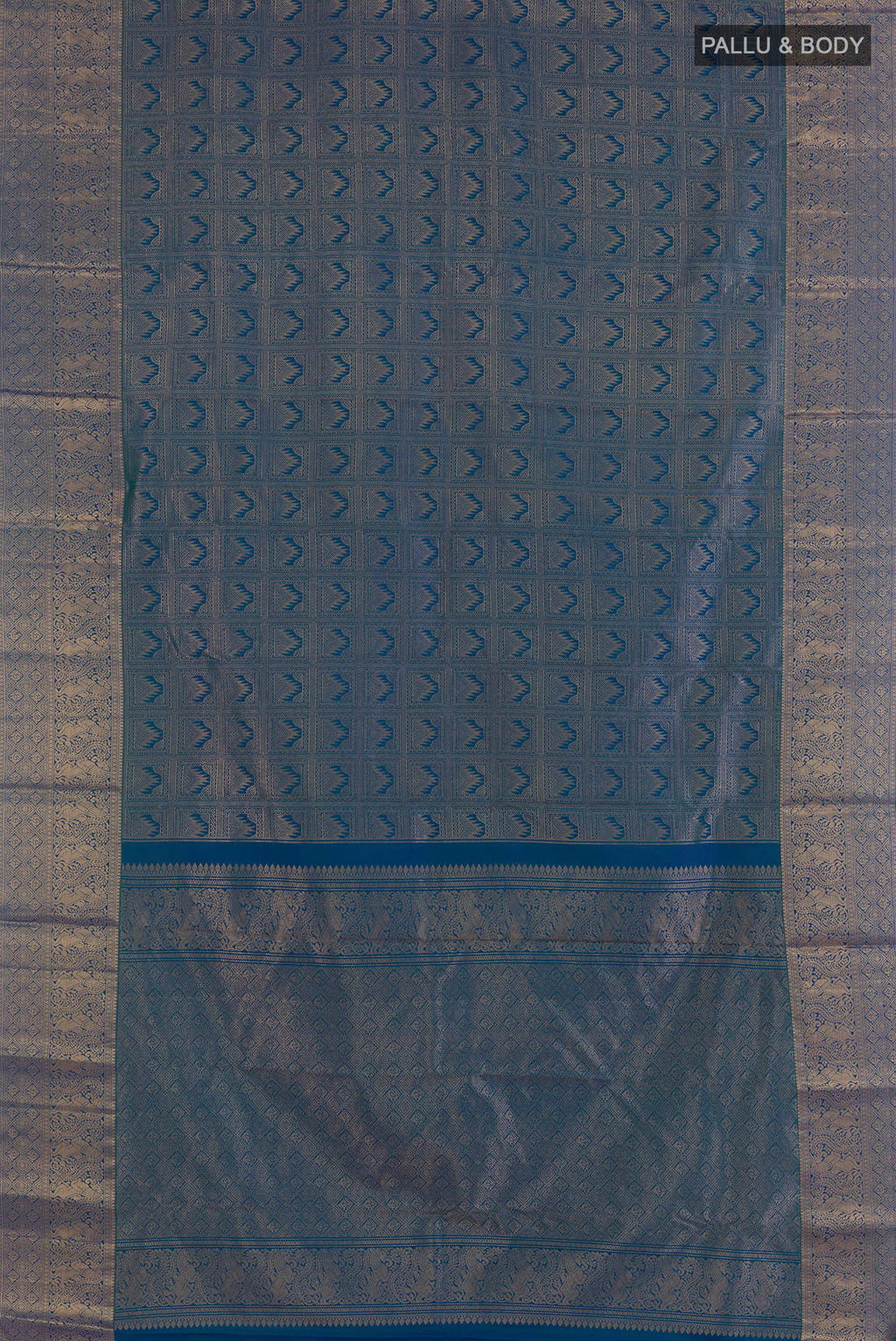 Flat view of Pure Silk Peacock Blue Kanchipuram Saree with Zari Brocade on the body and Zari Border. 