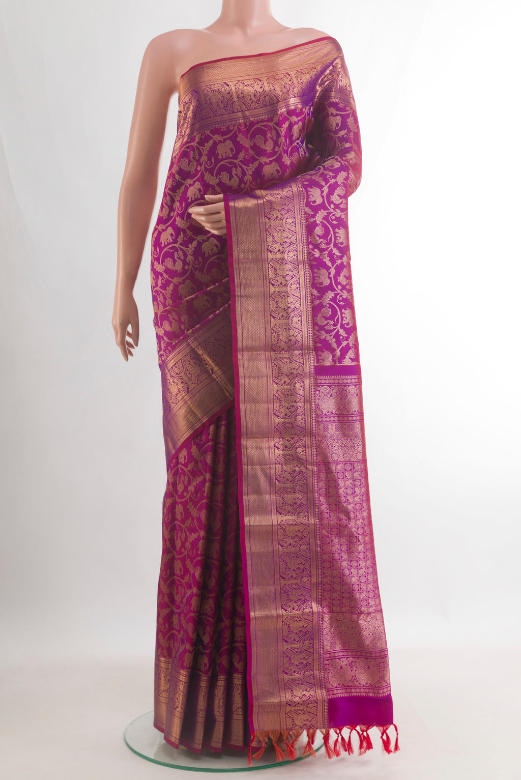 Pure Silk Magenta Dual Tone Kanchipuram Saree with Zari Brocade on the body and Zari Border.  displayed on a mannequin