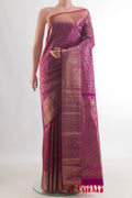 Pure Silk Magenta Kanchipuram Saree with Zari Brocade on the body and Zari Border.  displayed on a mannequin