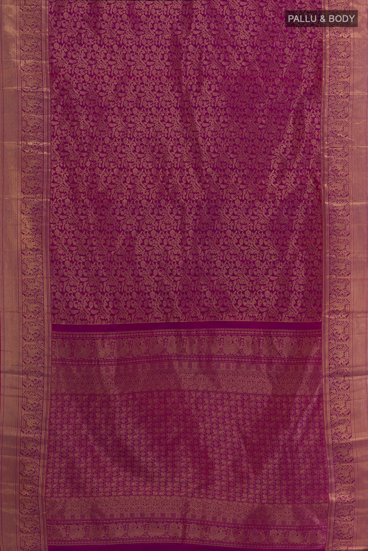Flat view of Pure Silk Magenta Kanchipuram Saree with Zari Brocade on the body and Zari Border. 