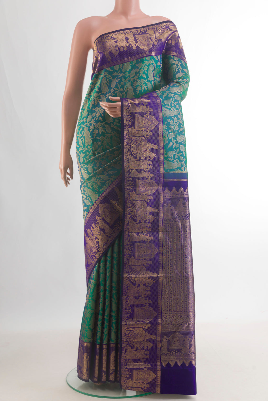 Pure Silk Sea Green Dual Tone Kanchipuram Saree with Zari Brocade on the body and Fancy Border.  displayed on a mannequin