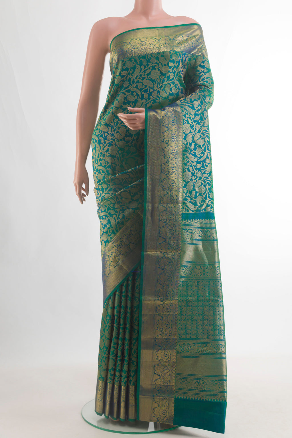 Pure Silk Green Dual Tone Kanchipuram Saree with Zari Brocade on the body and Zari Border.  displayed on a mannequin