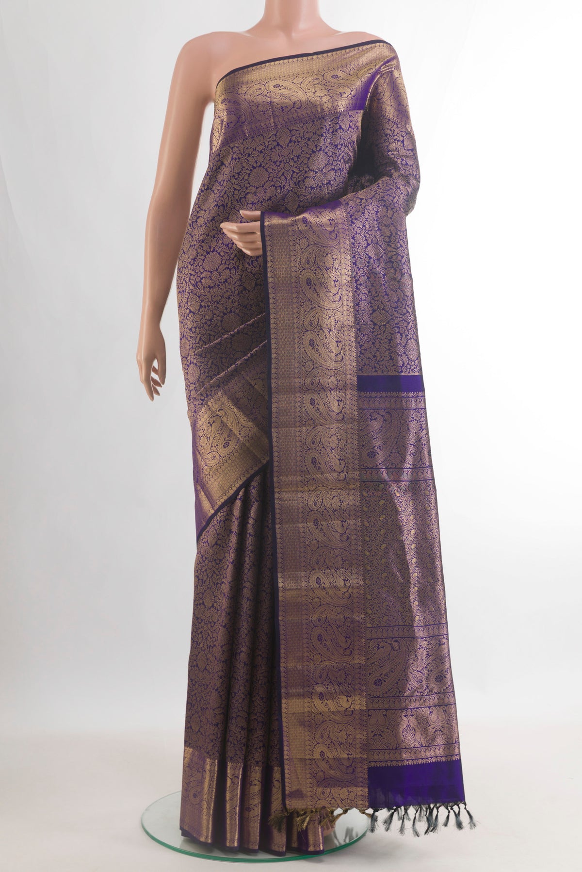 Pure Silk Dark Blue Kanchipuram Saree with Zari Brocade on the body and Zari Border.  displayed on a mannequin