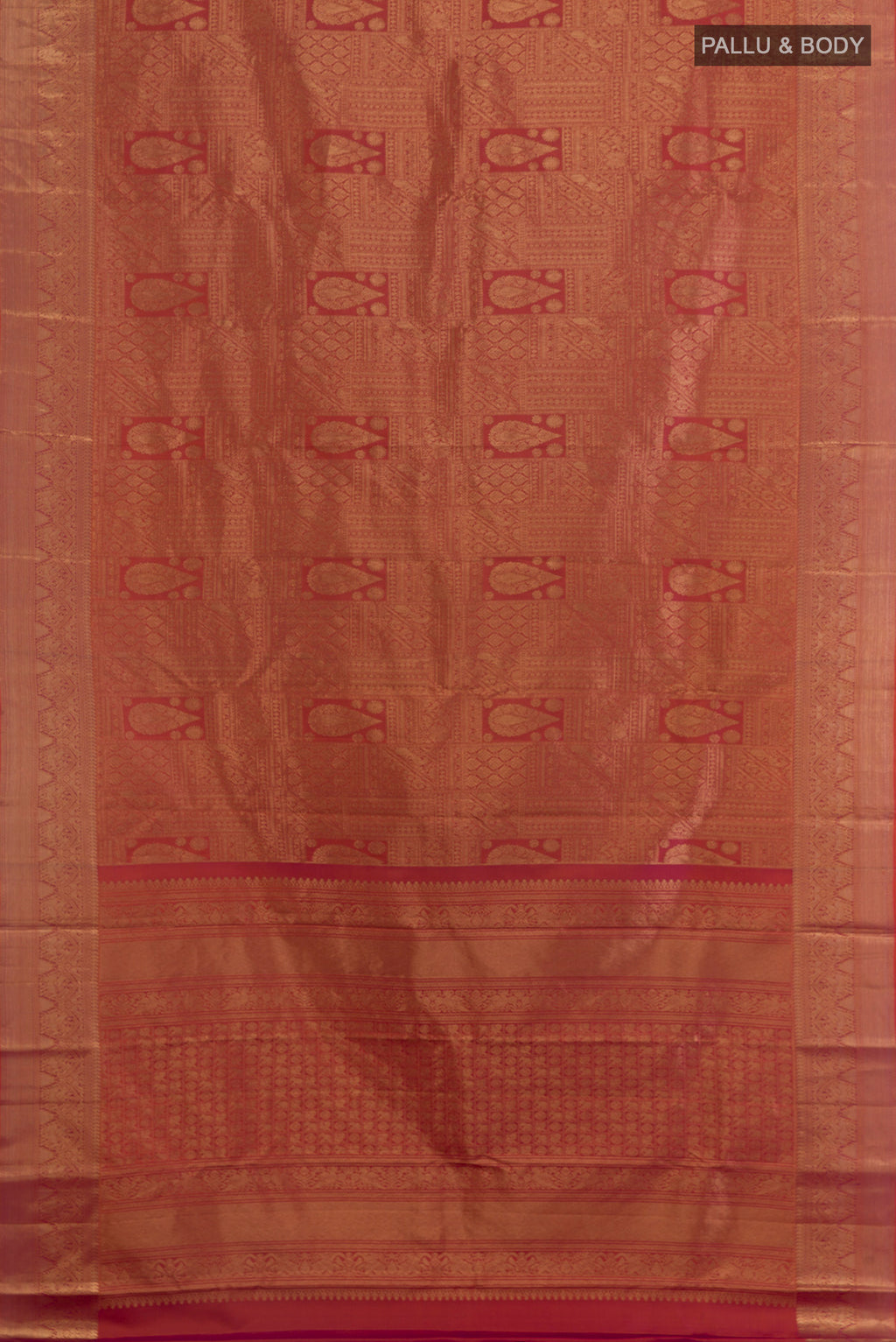 Flat view of Pure Silk Brick Orange with Magenta Color Kanchipuram Saree with Zari Brocade on the body and Zari Border. 