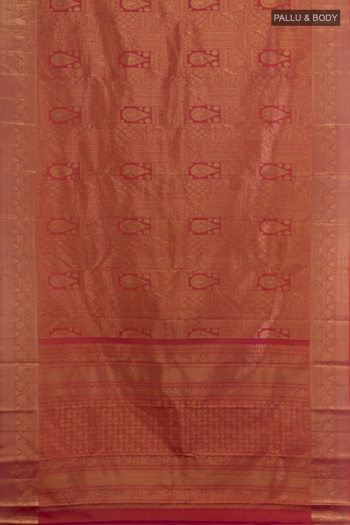 Flat view of Pure Silk Brick Orange with Magenta Color Kanchipuram Saree with Zari Brocade on the body and Zari Border. 