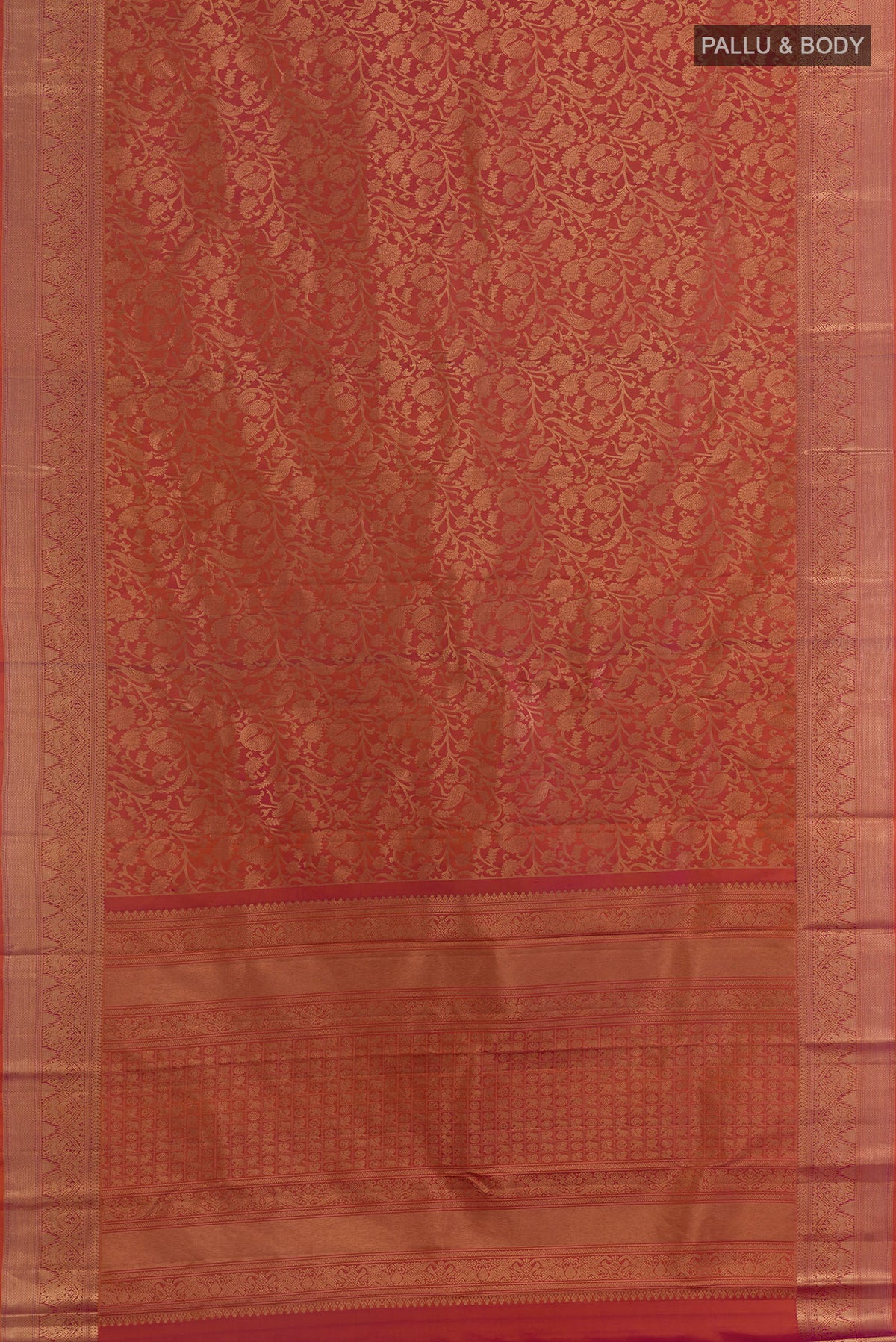 Flat view of Pure Silk Brick Orange with Magenta Color Kanchipuram Saree with Zari Brocade on the body and Zari Border. 