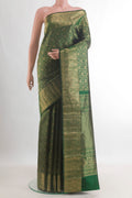 Pure Silk Green Kanchipuram Saree with Zari Brocade on the body and Zari Border.  displayed on a mannequin