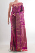 Pure Silk Magenta Kanchipuram Saree with Zari Brocade on the body and Fancy Border.  displayed on a mannequin