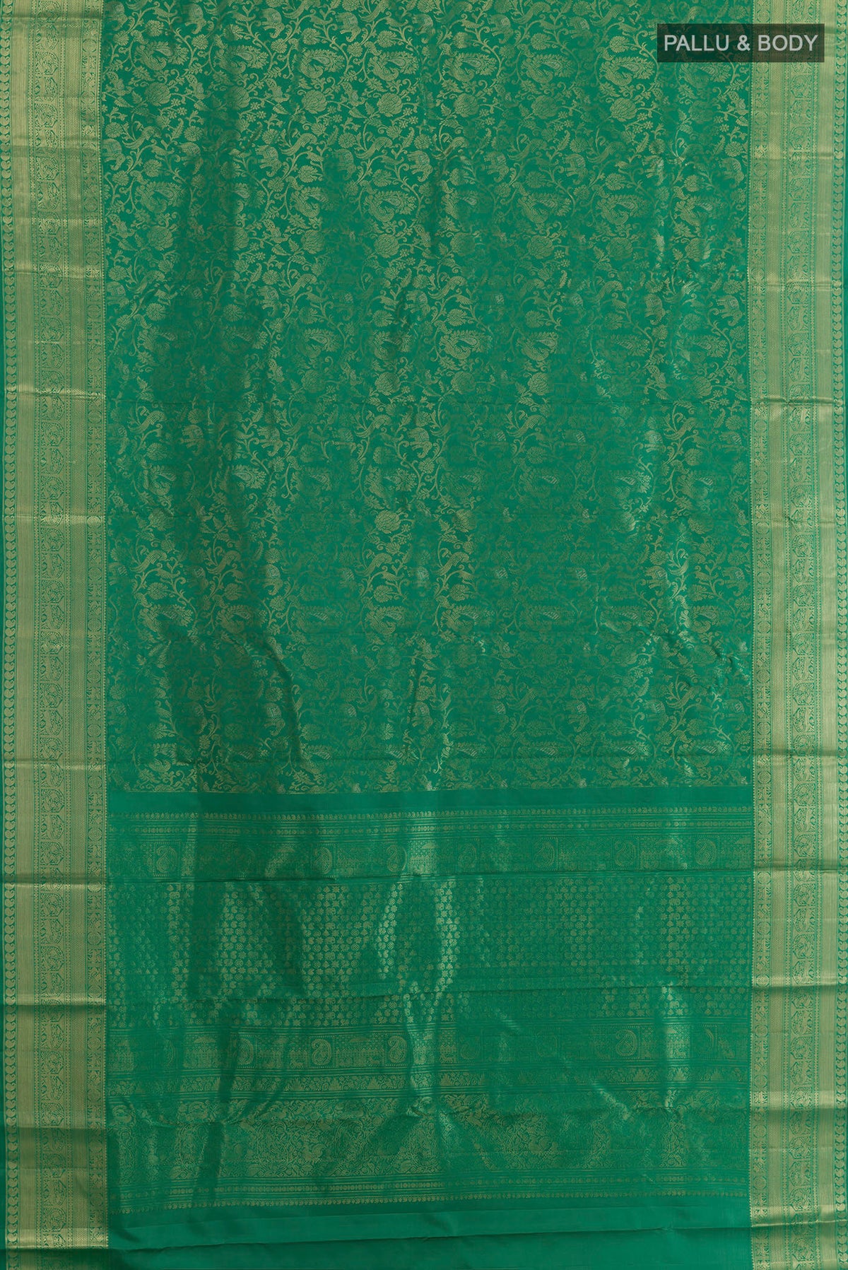 Flat view of Pure Silk Green Kanjivaram Saree with Zari Brocade on the body and Zari Border. 