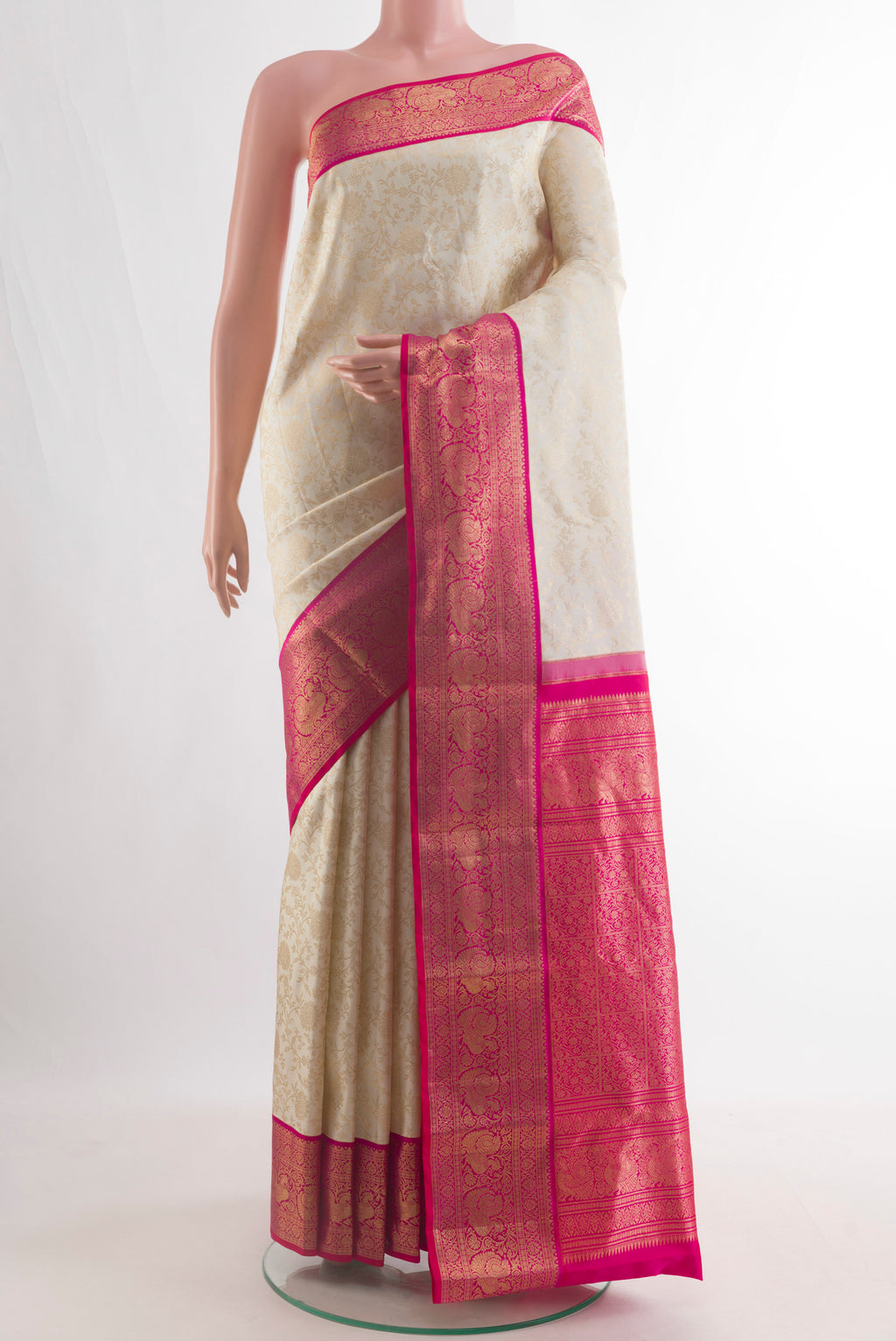 Pure Silk Off White Kanjivaram Saree with Zari Brocade on the body and Zari Border.  displayed on a mannequin