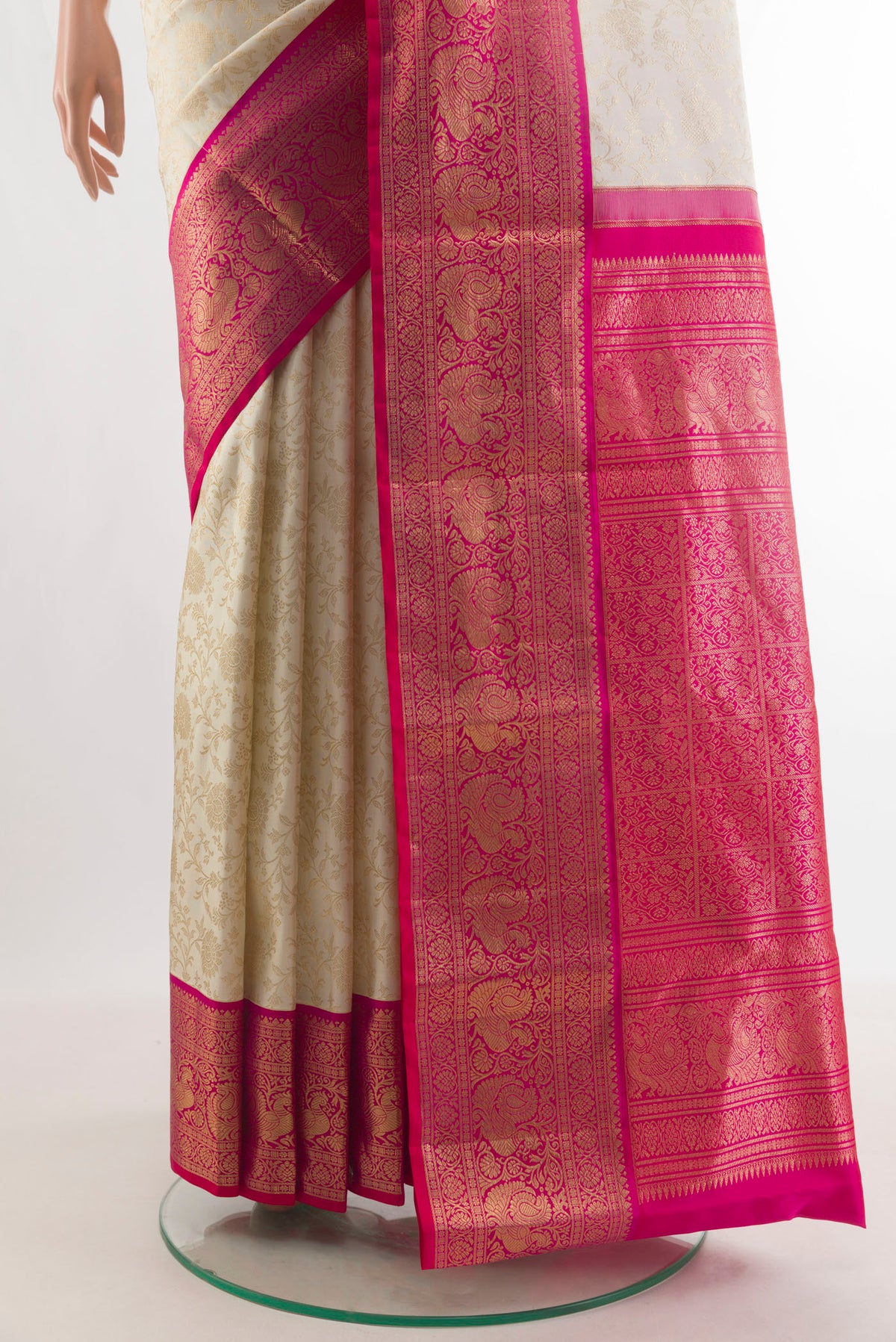 Pleats and pallu of Pure Silk Off White Kanjivaram Saree with Zari Brocade on the body and Zari Border. 