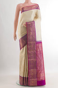 Pure Silk Off White Kanjivaram Saree with Zari Brocade on the body and Zari Border.  displayed on a mannequin