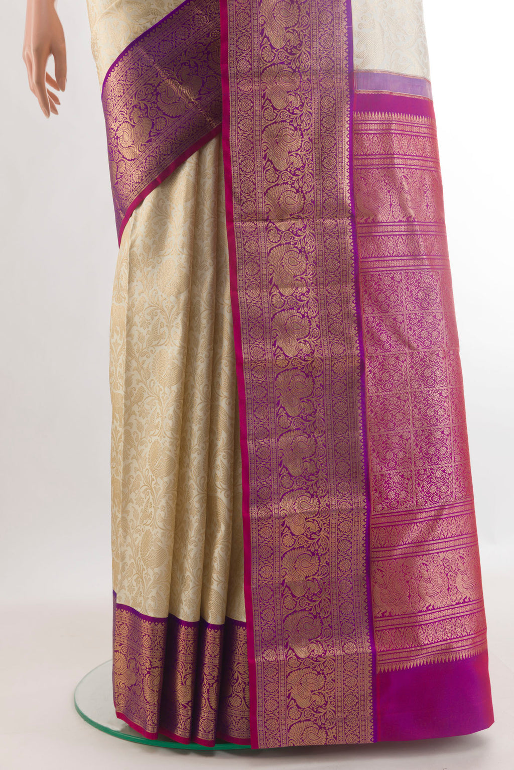 Pleats and pallu of Pure Silk Off White Kanjivaram Saree with Zari Brocade on the body and Zari Border. 