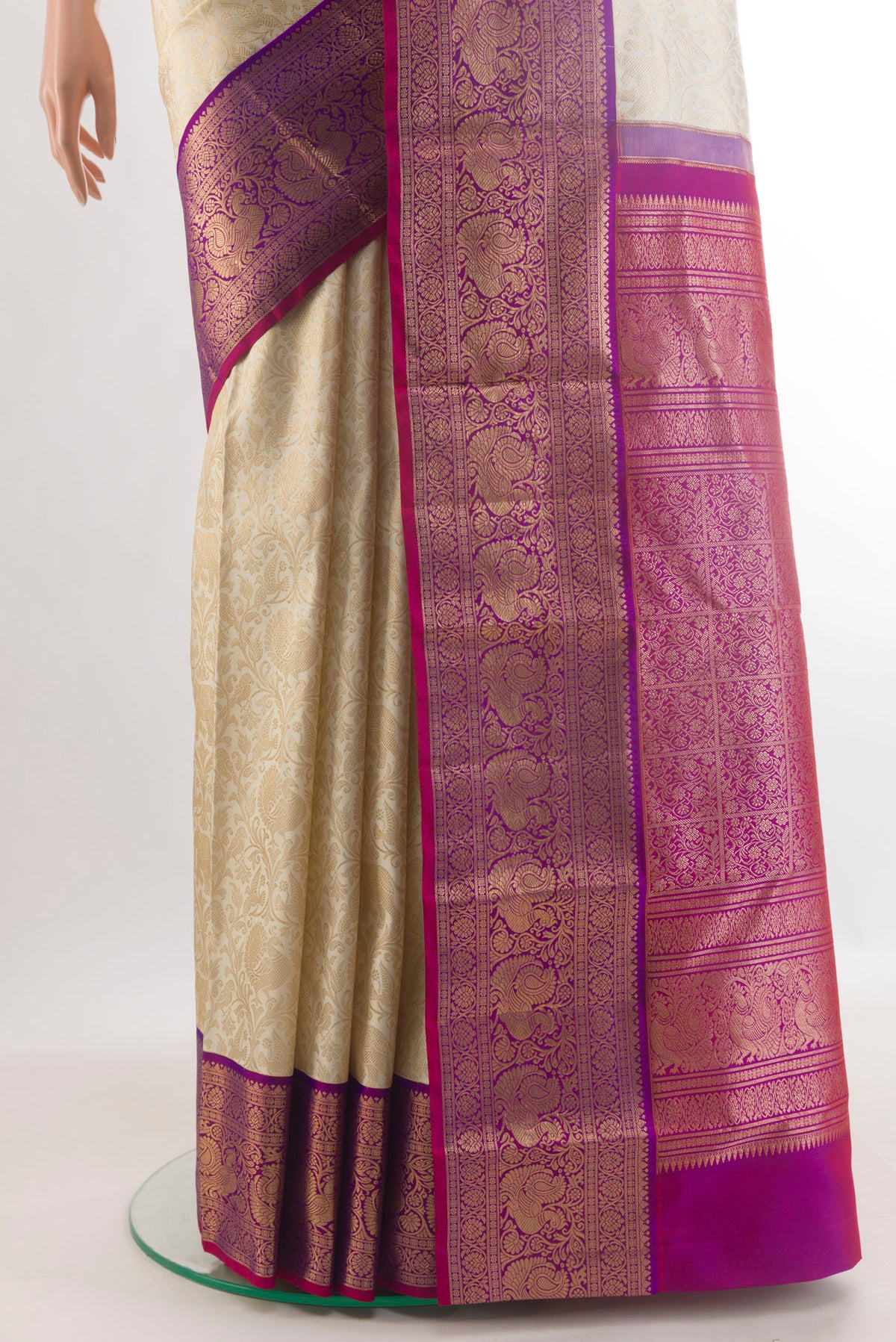 Pleats and pallu of Pure Silk Off White Kanjivaram Saree with Zari Brocade on the body and Zari Border. 