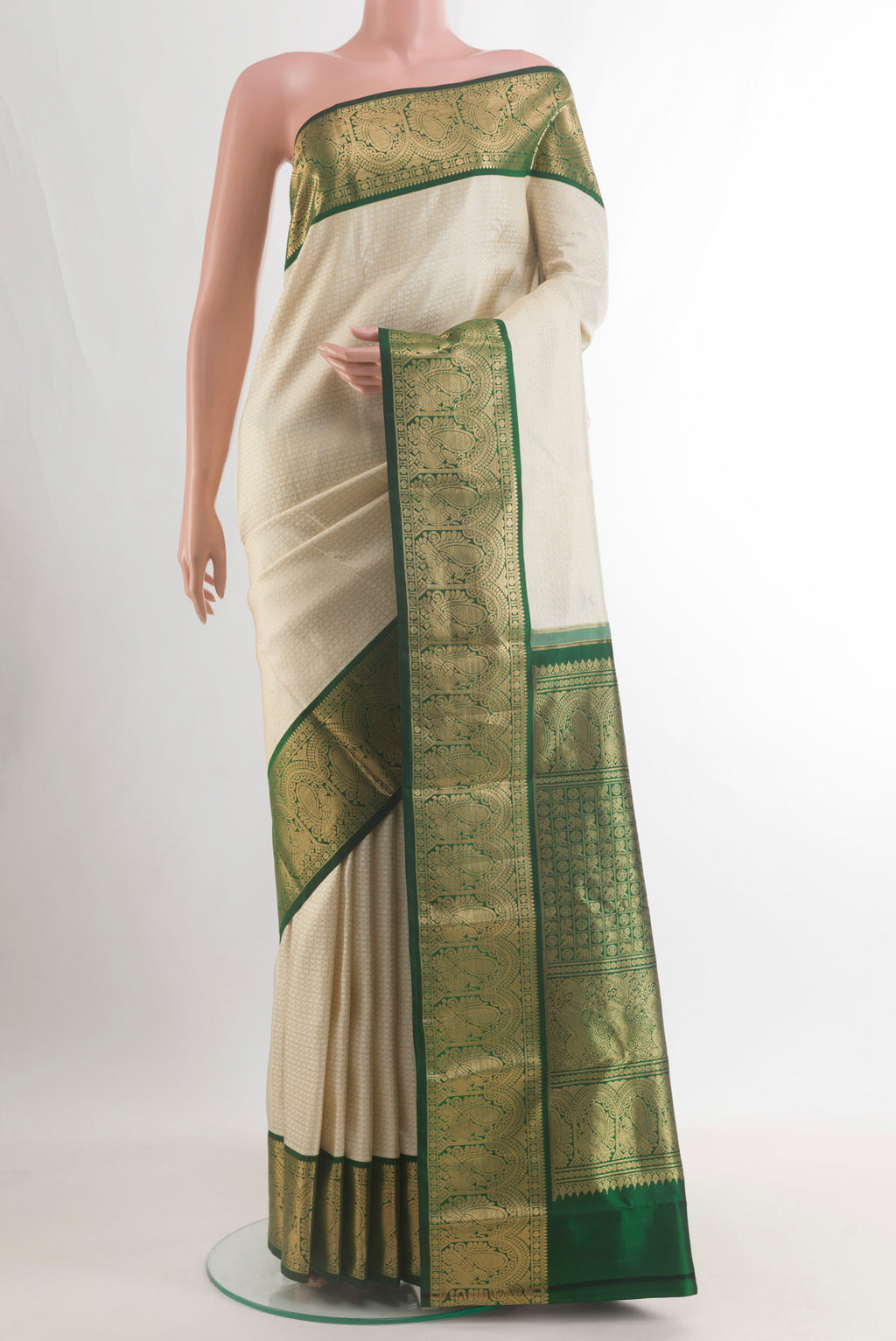 Pure Silk Off White Kanjivaram Saree with Zari Brocade on the body and Zari Border.  displayed on a mannequin