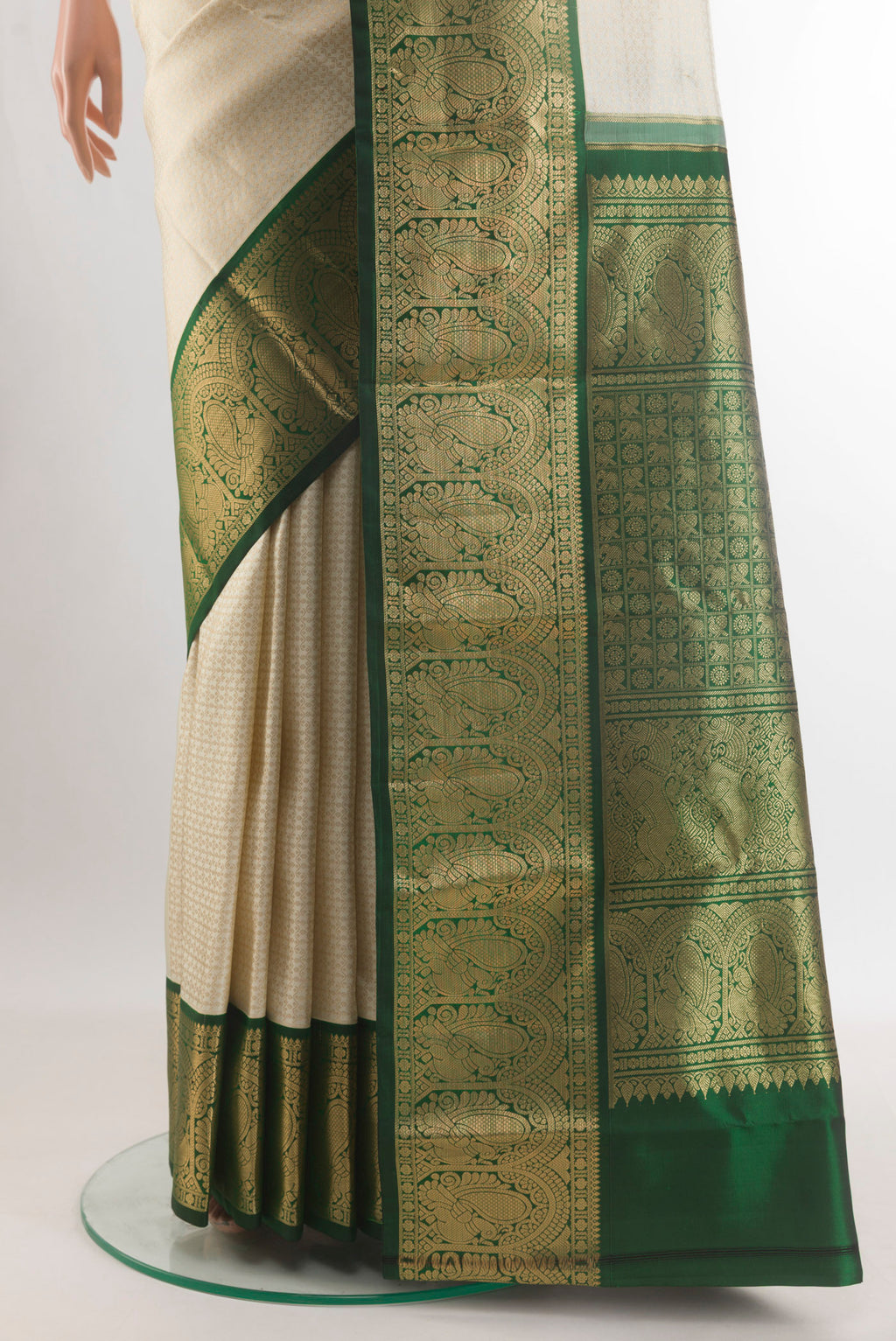 Pleats and pallu of Pure Silk Off White Kanjivaram Saree with Zari Brocade on the body and Zari Border. 