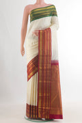 Pure Silk Off White Kanjivaram Saree with Zari Butta on the body and Ganga Jamuna Border.  displayed on a mannequin