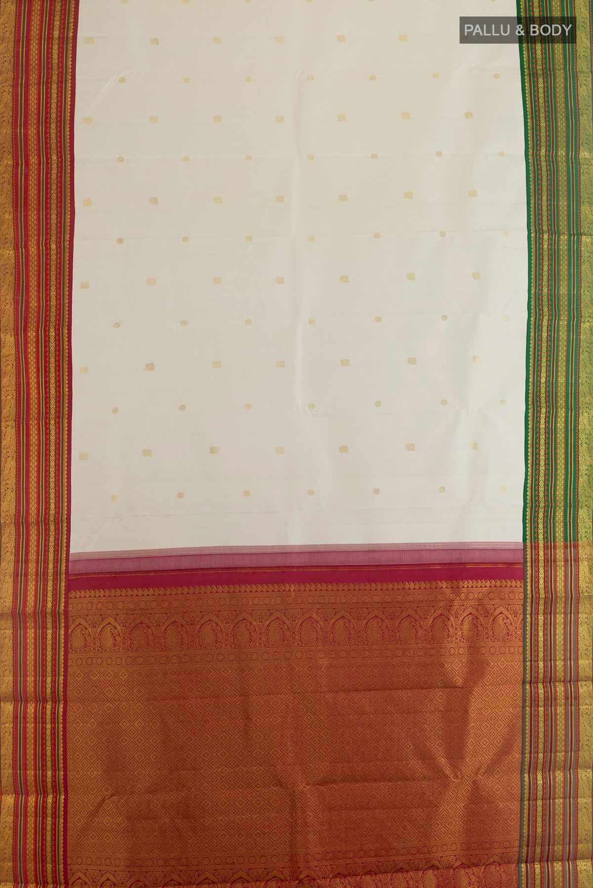 Flat view of Pure Silk Off White Kanjivaram Saree with Zari Butta on the body and Ganga Jamuna Border. 