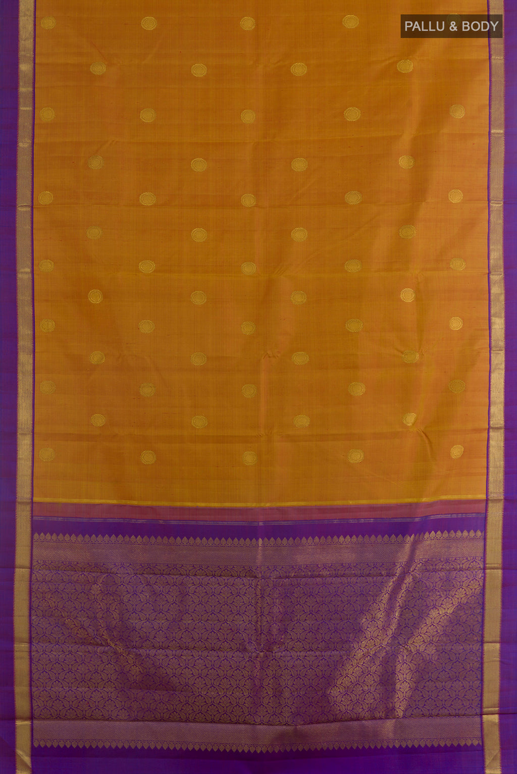 Flat view of Pure Silk Mustard Kanchipuram Saree with Zari Butta on the body and Zari Border. 